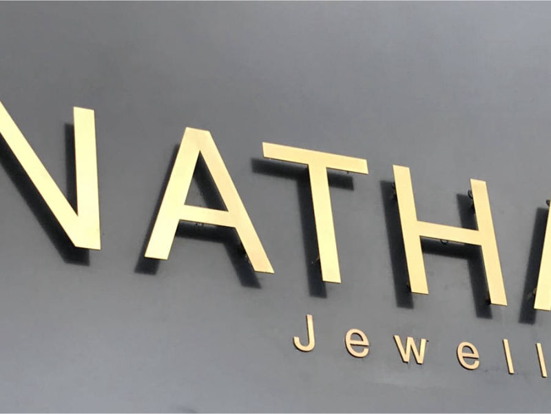 Brass raised lettering