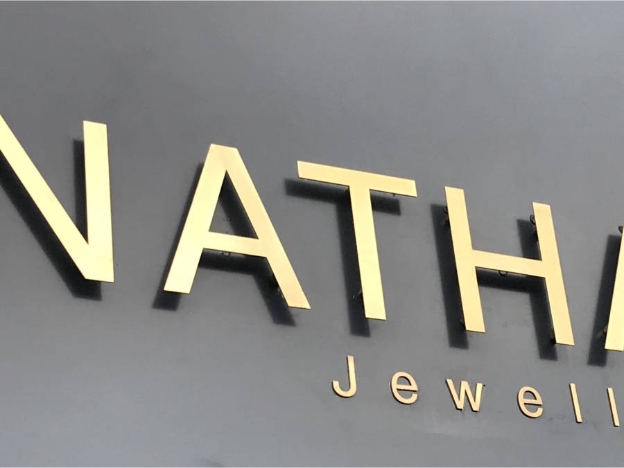 Brass raised lettering
